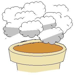 七輪から煙がもこもこ湧き出す様子