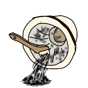 七輪の内部にこびりついた灰は刷毛を使ってかきだす